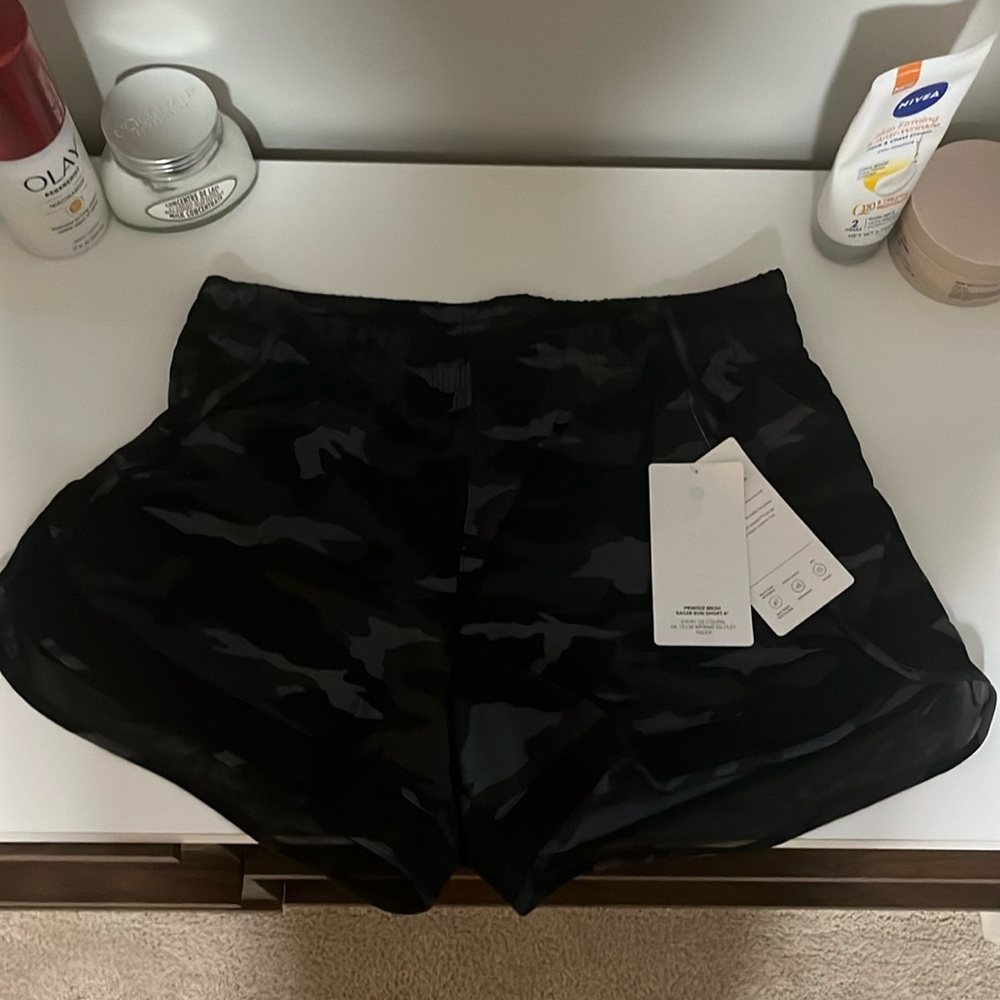 Athletes printed mesh racer run short 4”